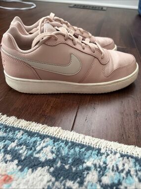 Nike Women's Blush Pink Low-Top Sneakers with Cream Swoosh